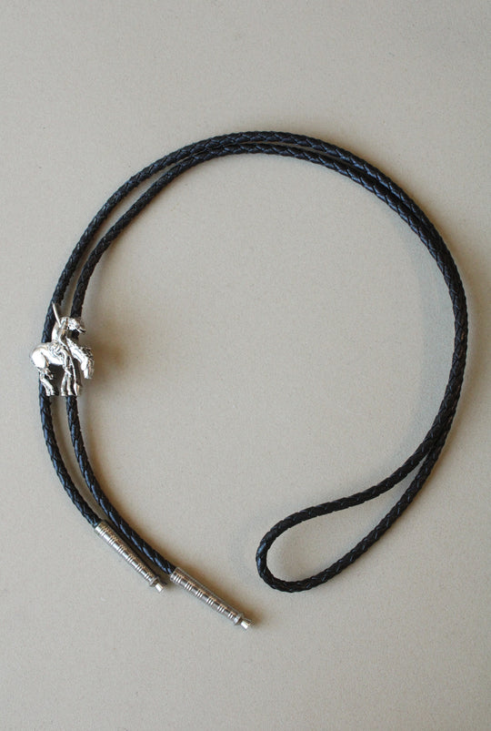 Native Cowboy On Bronco Motif Braided Leather Bolo Tie