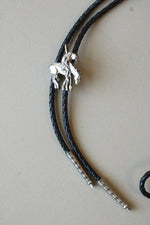 Native Cowboy On Bronco Motif Braided Leather Bolo Tie