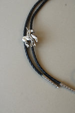 Native Cowboy On Bronco Motif Braided Leather Bolo Tie