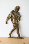 Johnny Appleseed Brass Painted Cast Iron Wall Hanging