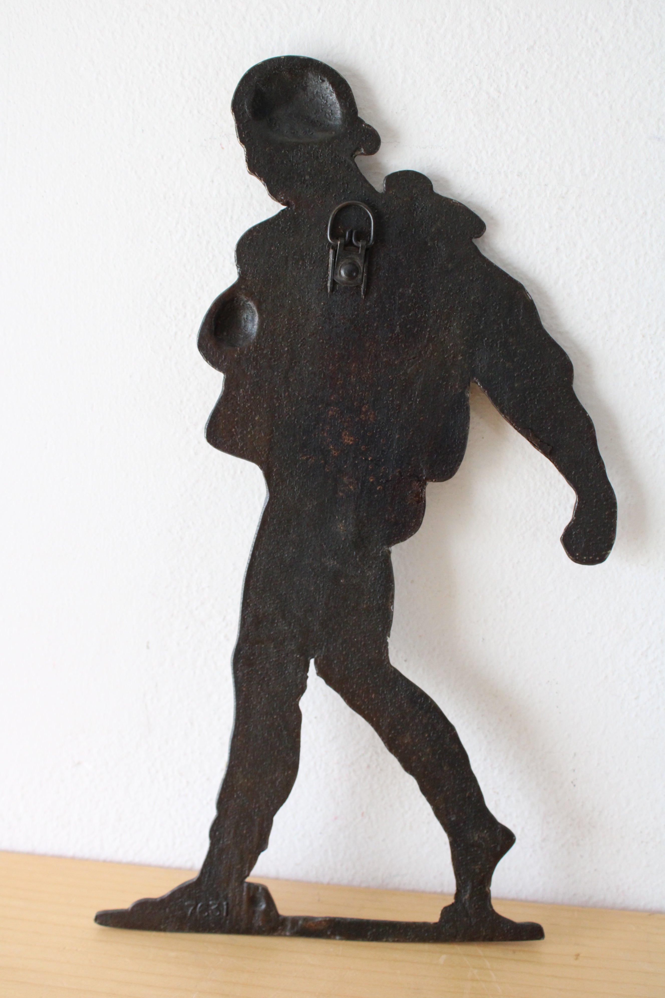 Johnny Appleseed Brass Painted Cast Iron Wall Hanging