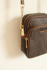 Michael Kors Brown Logo Print Medium Jet Set Travel Crossbody Bag