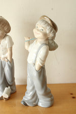 Zaphir Boy Kicking Can & Boy Runaway Bindle Tramp Porcelain Figurines