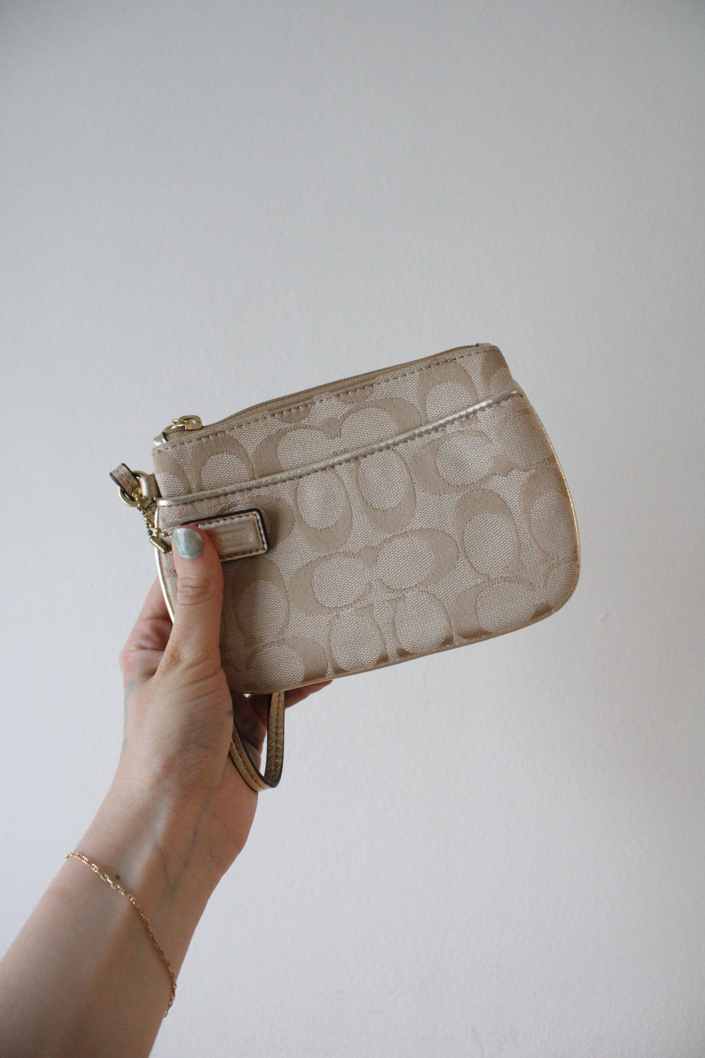Coach Gold Monogram Wristlet Wallet