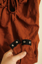 NEW 4Sienna Rust Spaghetti Strap Bodysuit With Cutout And Tie | M