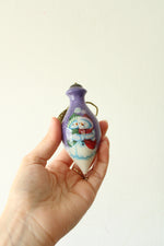 Ne' Qwa Art "XOXO" Snowman Ornament by Gillian Roberts