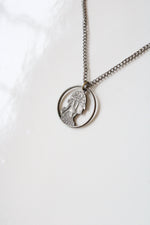 Cut Quarter Pendant Necklace