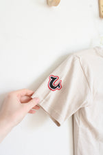 True Religion Tan T-Shirt With Black And Red Logo And Silver Studs
