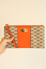 Michael Kors Orange Center Stripe Clutch Wristlet