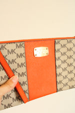 Michael Kors Orange Center Stripe Clutch Wristlet