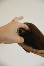 Coach Tan Leather Front Buckle Wristlet