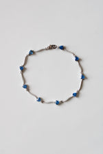 White 14K Gold Blue Topaz Bracelet