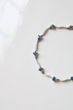 White 14K Gold Blue Topaz Bracelet
