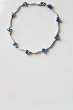 White 14K Gold Blue Topaz Bracelet