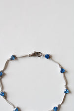 White 14K Gold Blue Topaz Bracelet