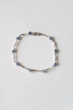 White 14K Gold Blue Topaz Bracelet