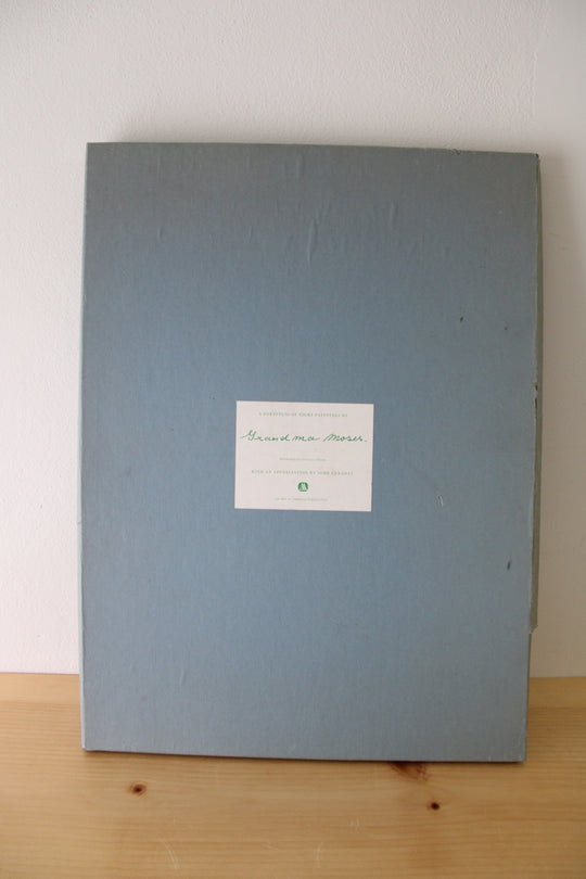 A Portfolio Of Eight Paintings By Grandma Moses