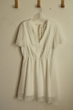 White Lace Dress with Embroidered Neckline and Details