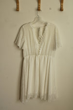 White Lace Dress with Embroidered Neckline and Details