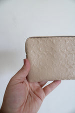 Coach Signature Debossed Patent Leather Tan Wristlet