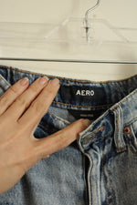AERO Light-wash Distressed Denim Mini Skirt | 00