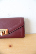 Michael Kors Kinsley Carryall Maroon Leather Wallet
