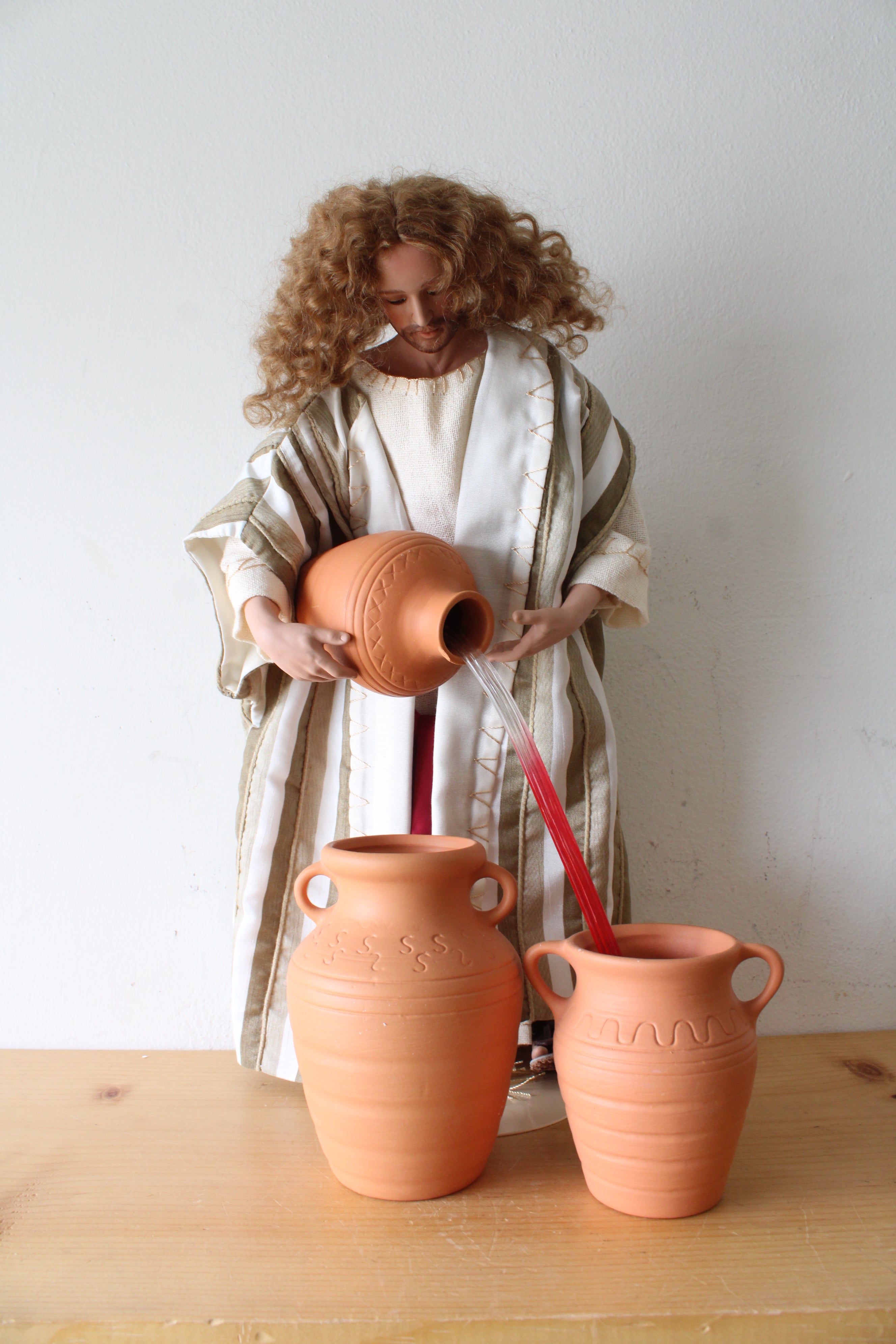 The Ashton-Drake Galleries Jesus Turning Water Into Wine Porcelain Doll