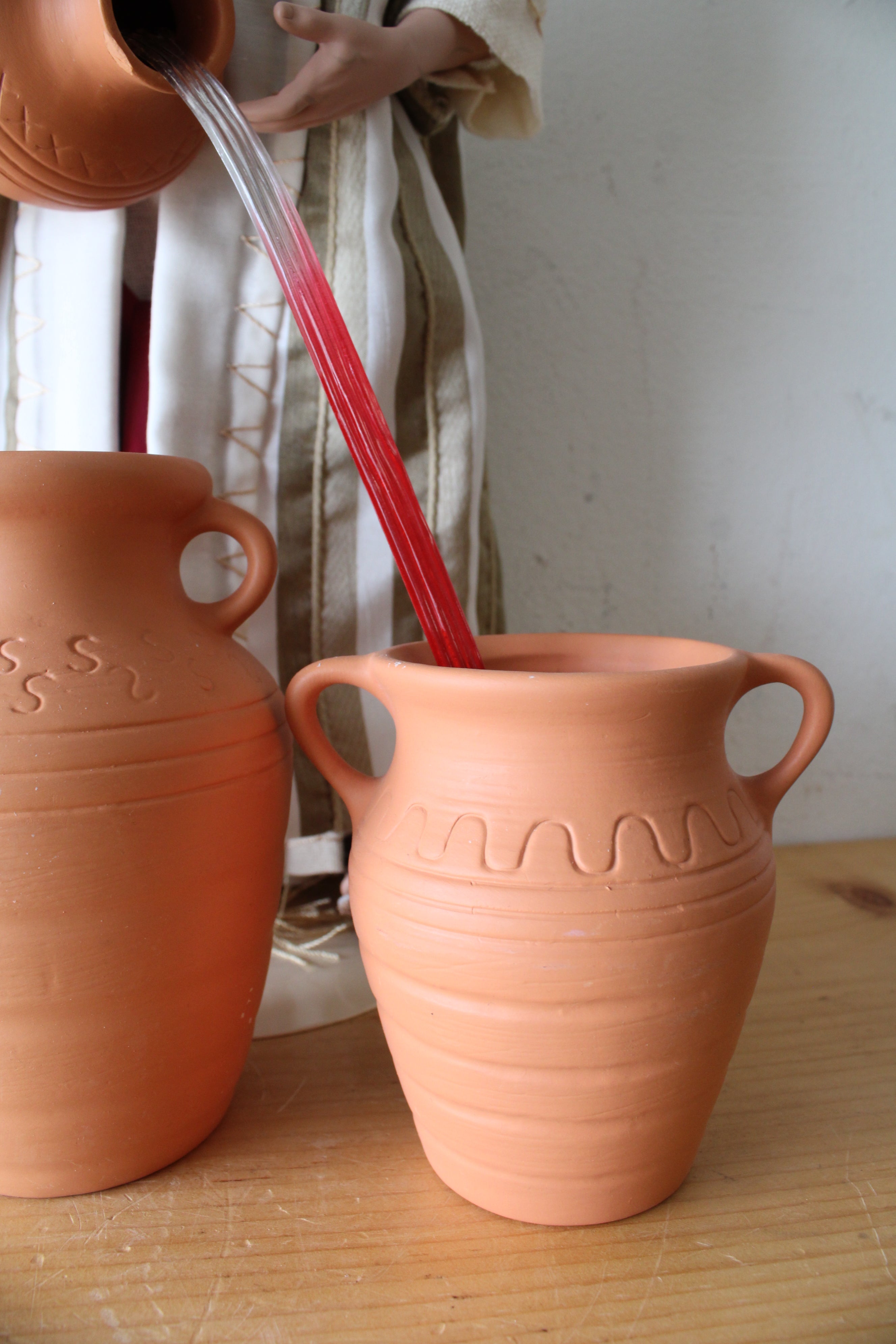 The Ashton-Drake Galleries Jesus Turning Water Into Wine Porcelain Doll